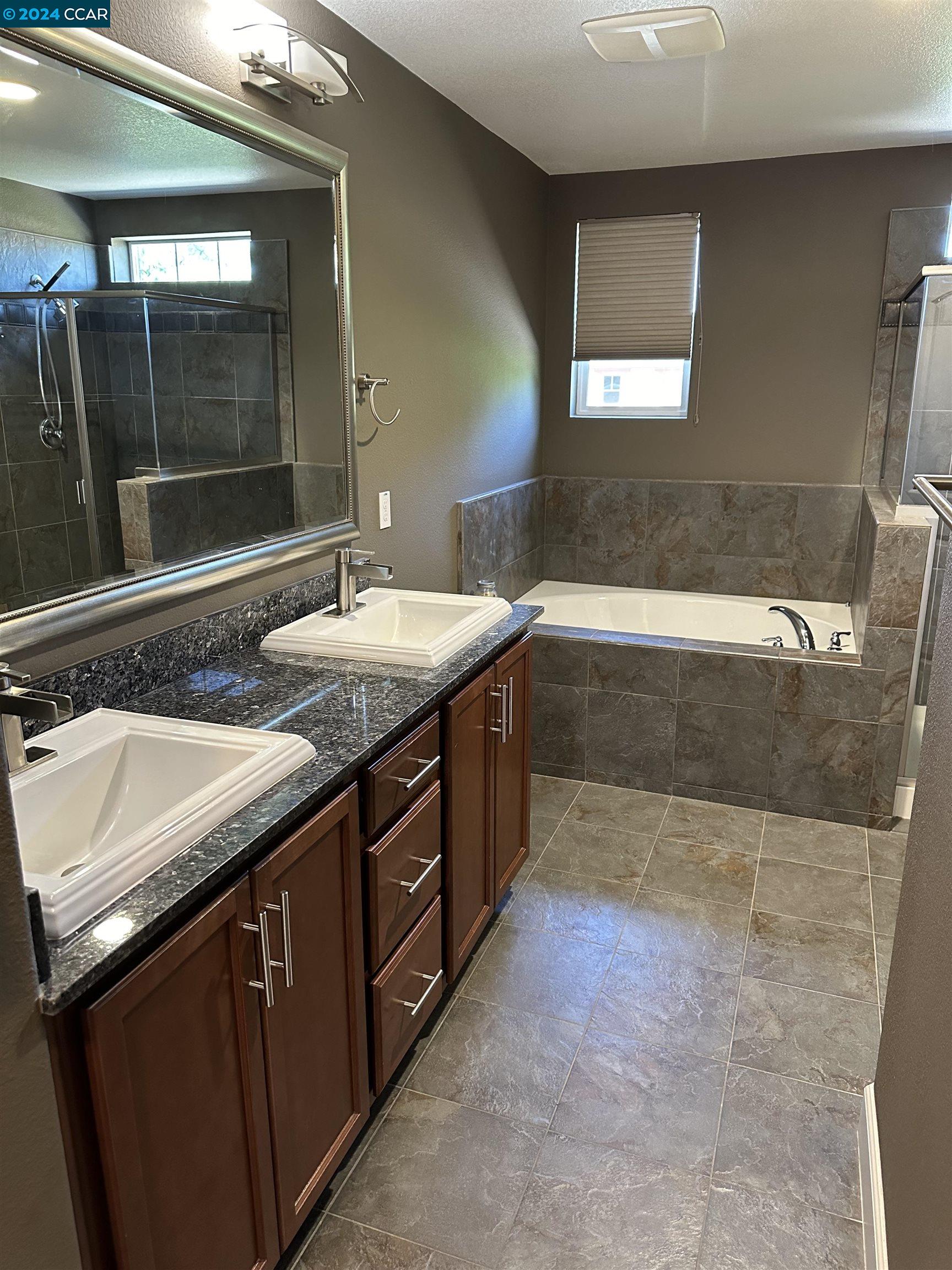 830 El Paseo Circle Walnut Creek, CA 94597 - Photo 9 of 16 a bathroom with a sink and a mirror