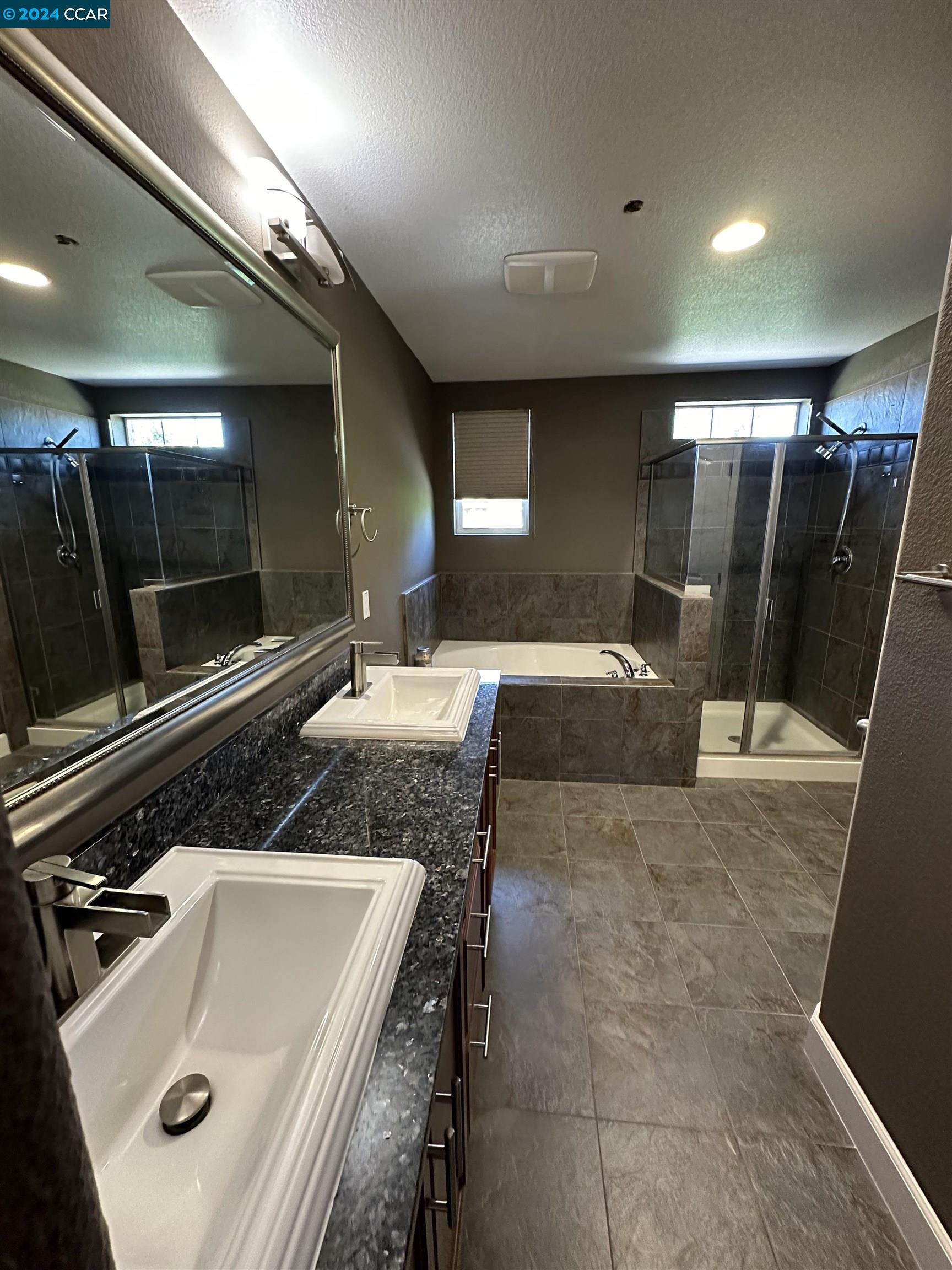 830 El Paseo Circle Walnut Creek, CA 94597 - Photo 10 of 16 a bathroom with a sink and a mirror
