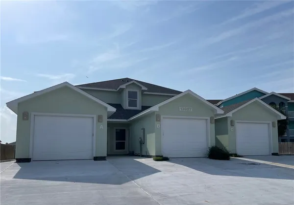 front view of a house with a garage