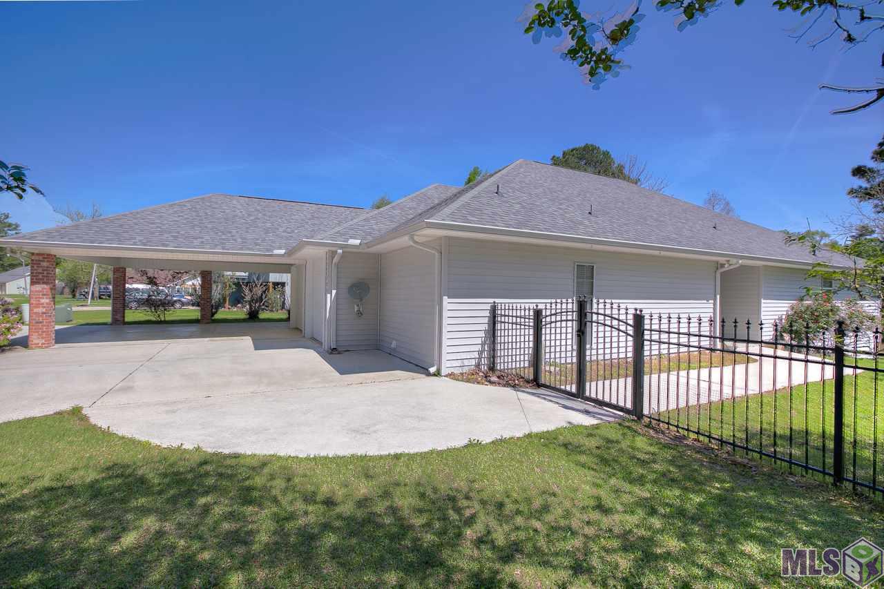 17428 Summerfield Road North Prairieville, LA 70769 - Photo 3 of 29 Side view with carport