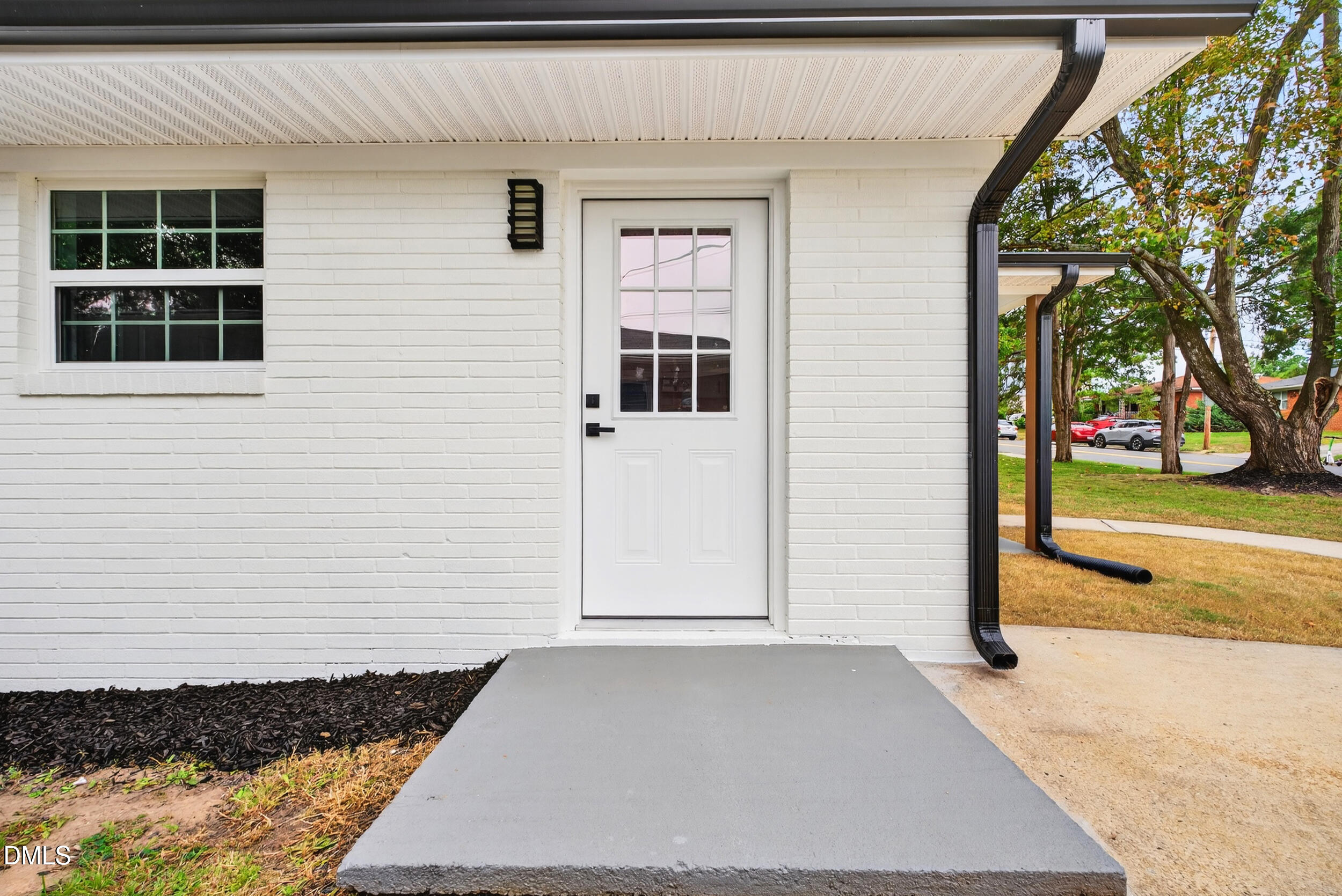 606 Cecil Street Durham, NC 27707 - Photo 21 of 25 a view of a house with a pathway