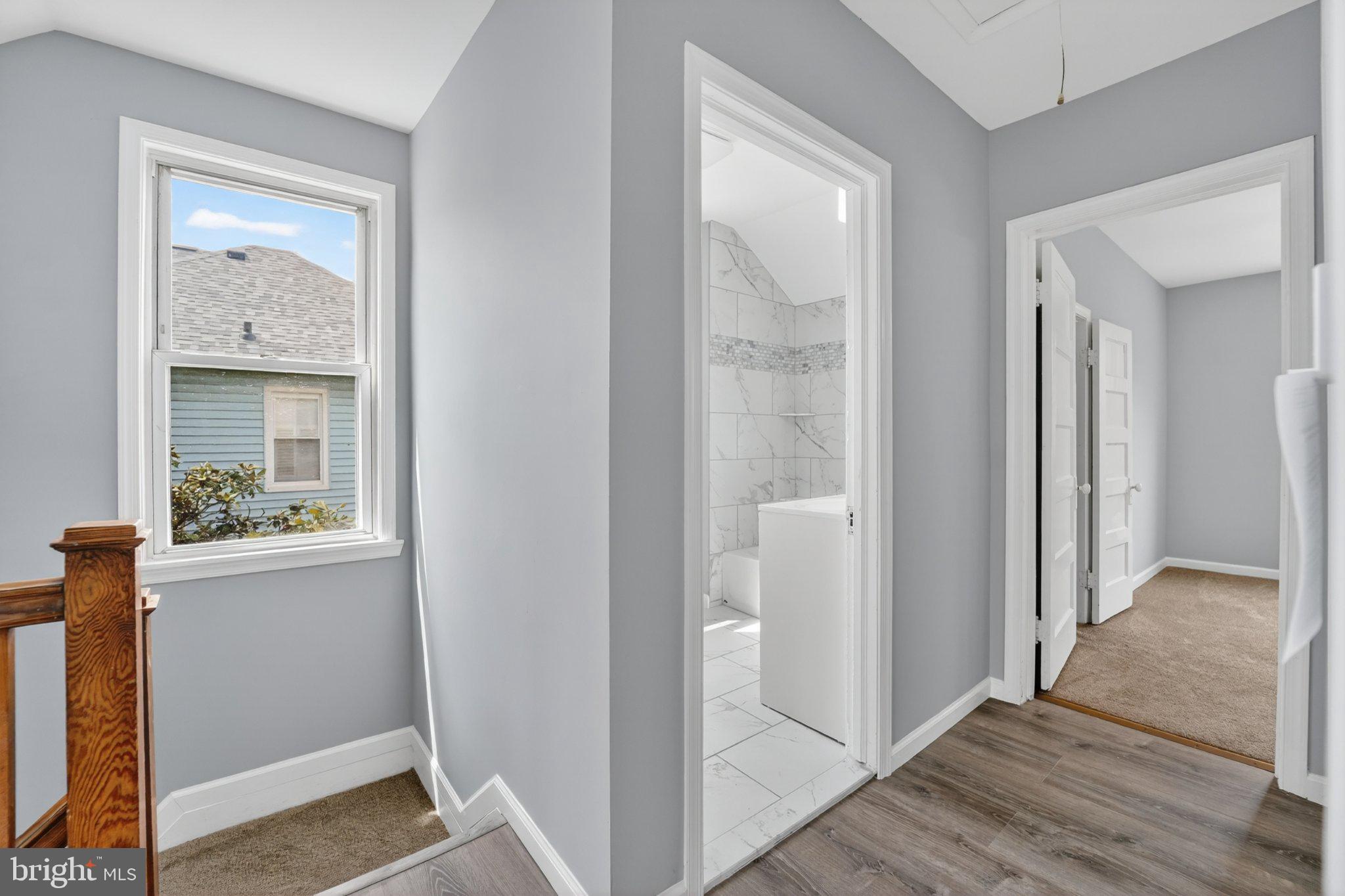 5312 Catalpha Road Baltimore, MD 21214 - Photo 51 of 59 Bright and airy hallway retreat.