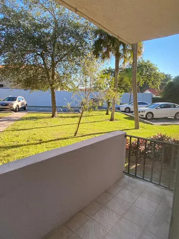 a view of swimming pool with an outdoor space and seating area