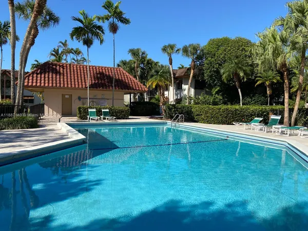 a view of a house with a swimming pool
