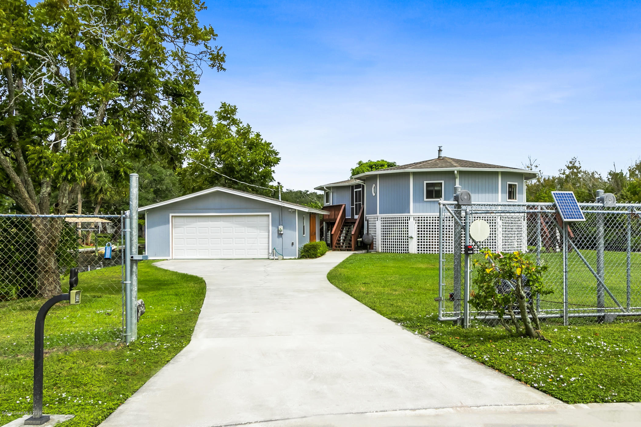 1191 Sunswept Road Northeast Palm Bay, FL 32905 - Photo 12 of 40 Private gate for added security