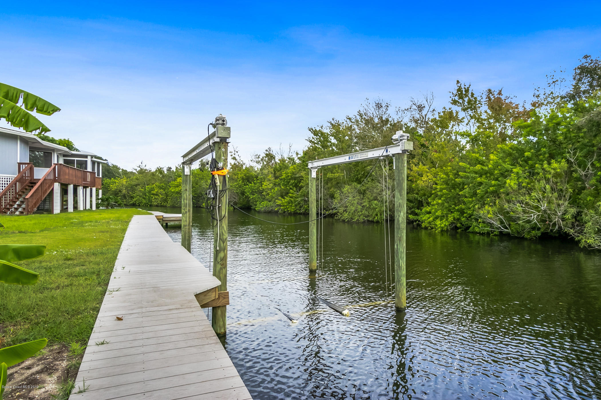 1191 Sunswept Road Northeast Palm Bay, FL 32905 - Photo 14 of 40 Boat lift