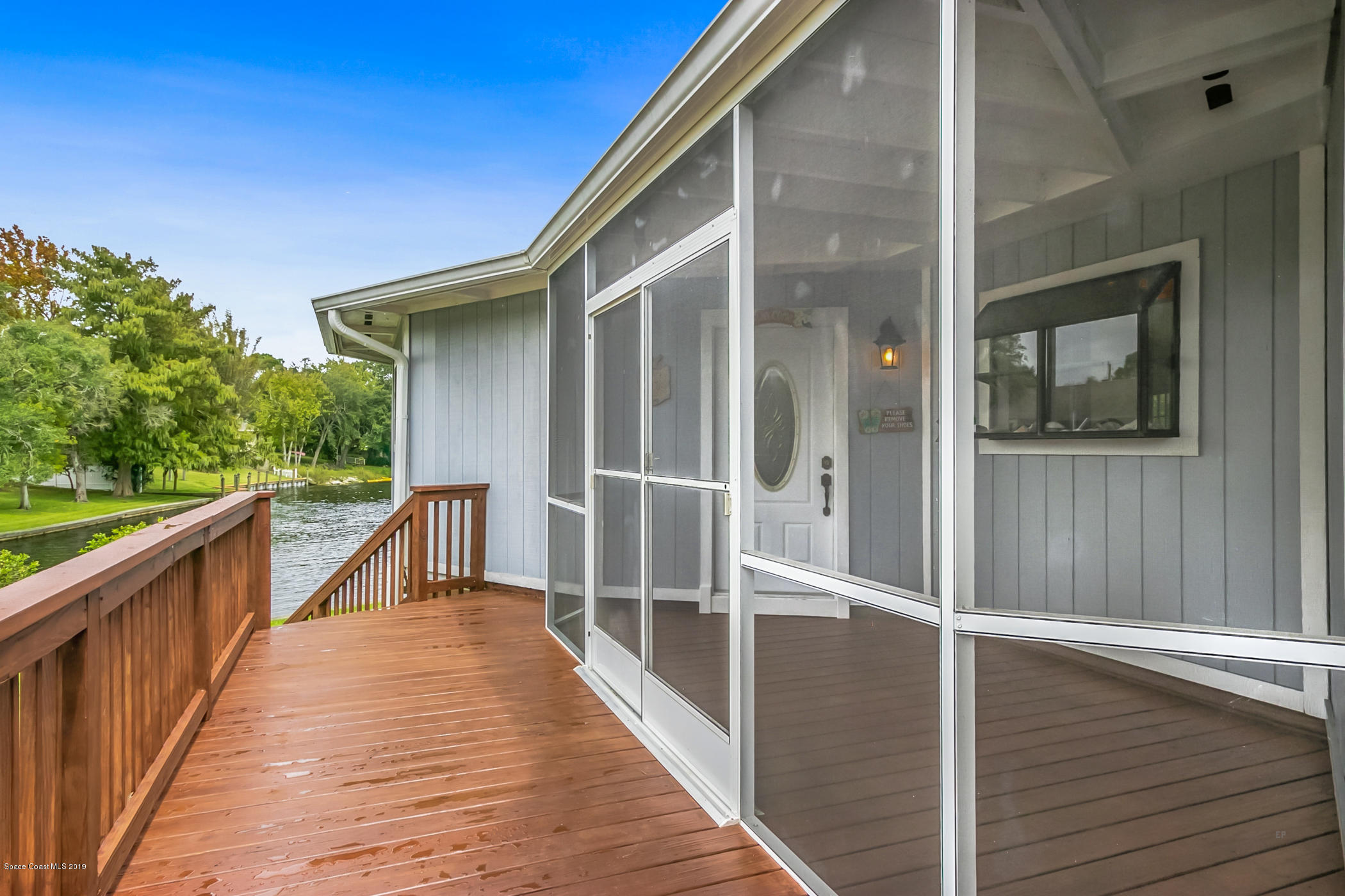 1191 Sunswept Road Northeast Palm Bay, FL 32905 - Photo 16 of 40 Screened front porch
