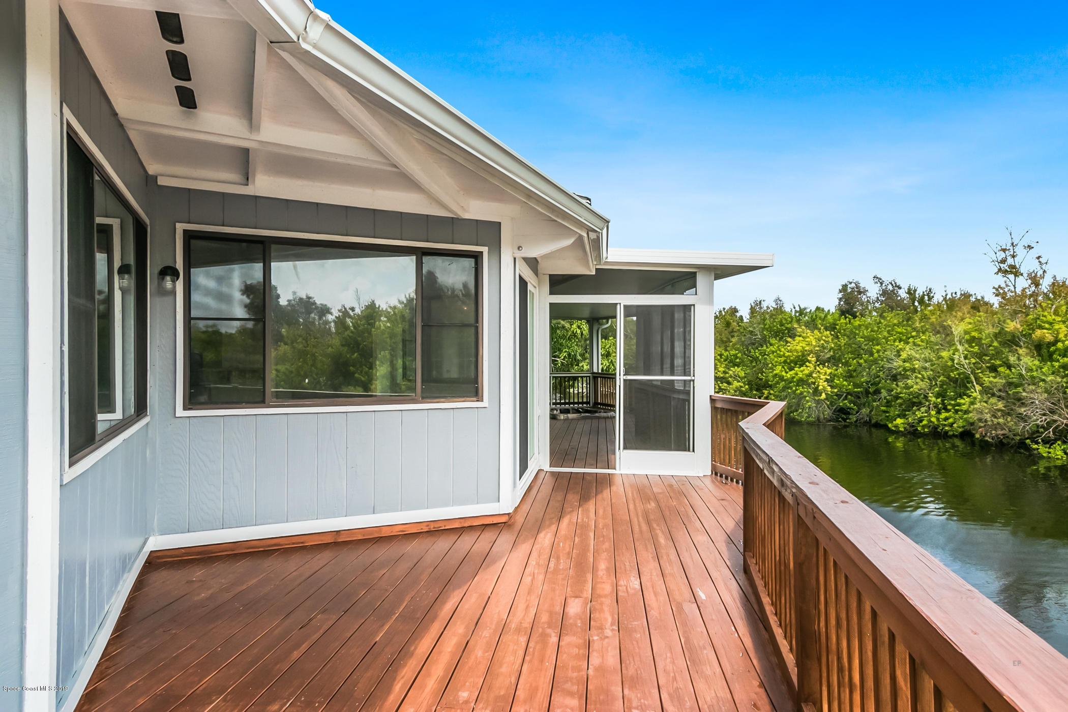 1191 Sunswept Road Northeast Palm Bay, FL 32905 - Photo 19 of 40 Open air deck backs to natural preserve