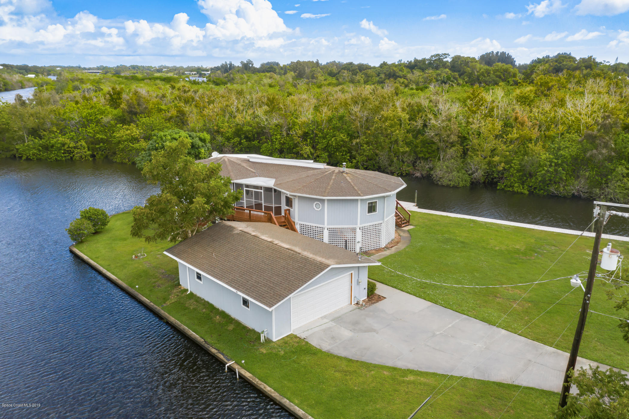 1191 Sunswept Road Northeast Palm Bay, FL 32905 - Photo 3 of 40 Oversized detached garage