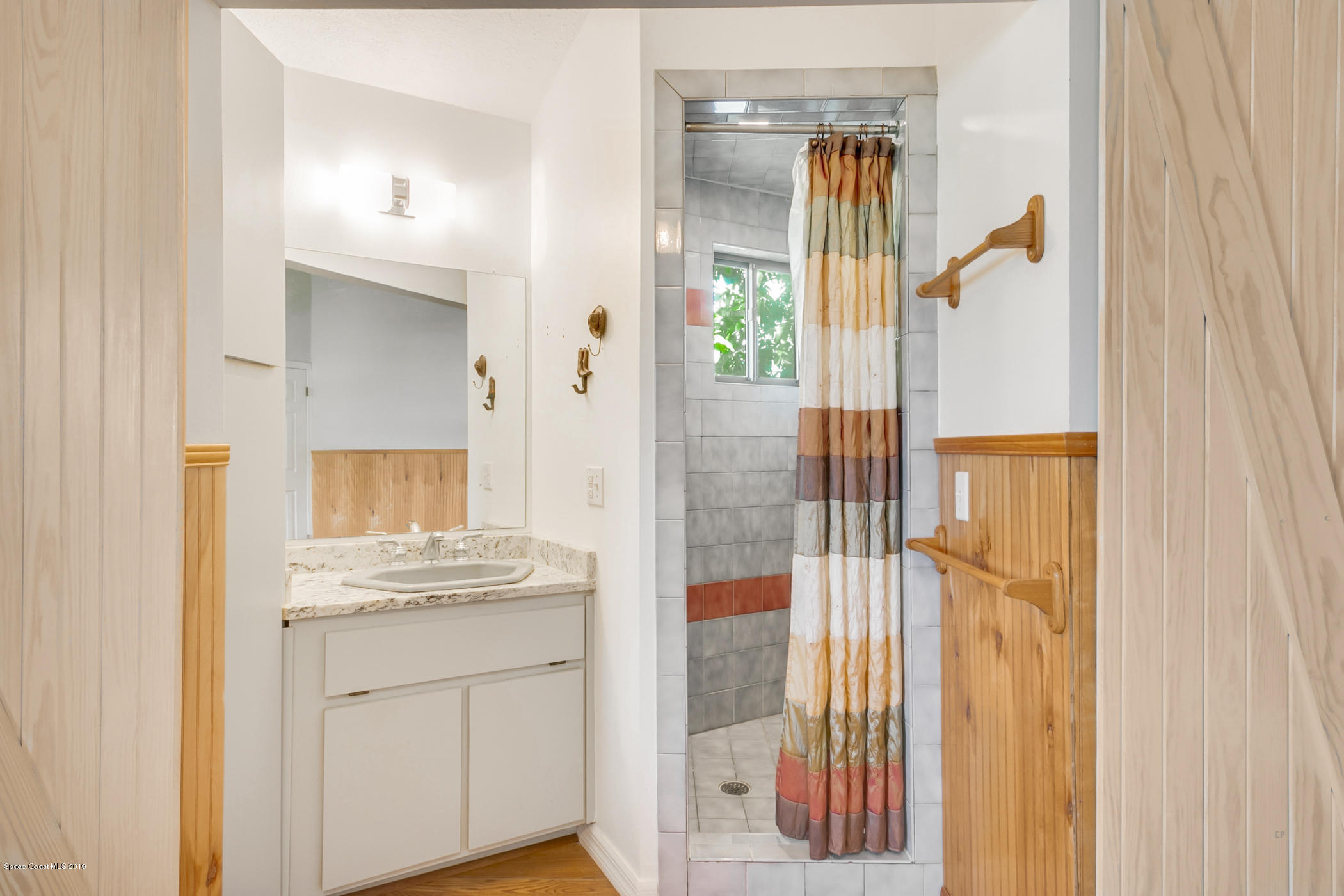 1191 Sunswept Road Northeast Palm Bay, FL 32905 - Photo 27 of 40 Owner's bathroom