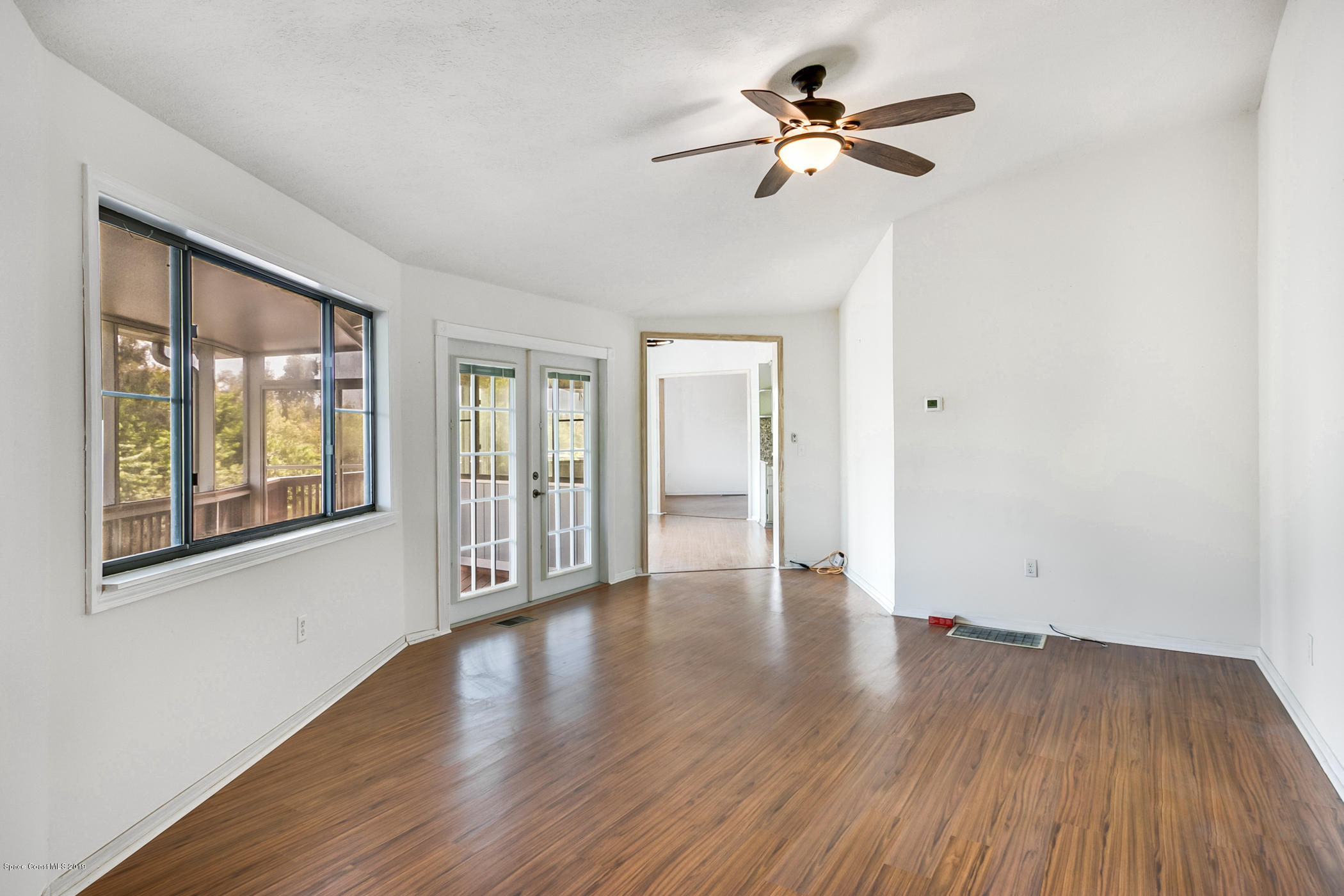 1191 Sunswept Road Northeast Palm Bay, FL 32905 - Photo 29 of 40 Multiple living spaces