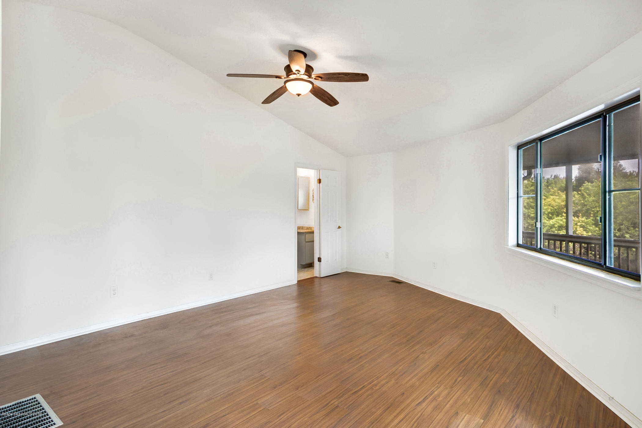 1191 Sunswept Road Northeast Palm Bay, FL 32905 - Photo 30 of 40 Living room or den--flexible options