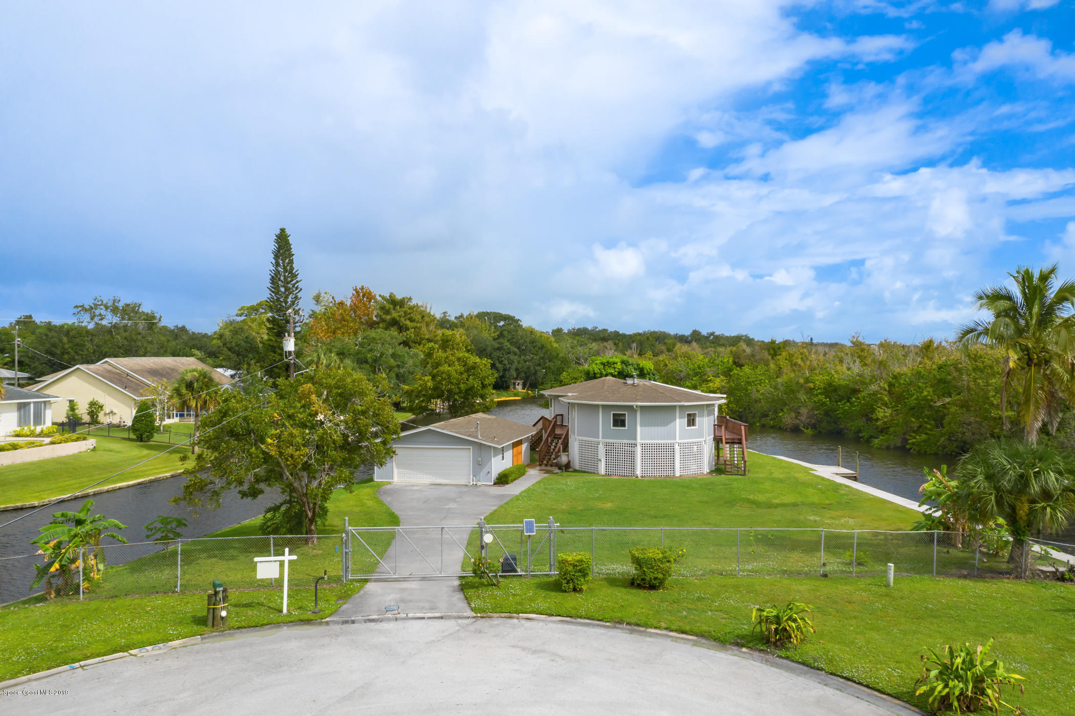 1191 Sunswept Road Northeast Palm Bay, FL 32905 - Photo 4 of 40 Private, gated lot