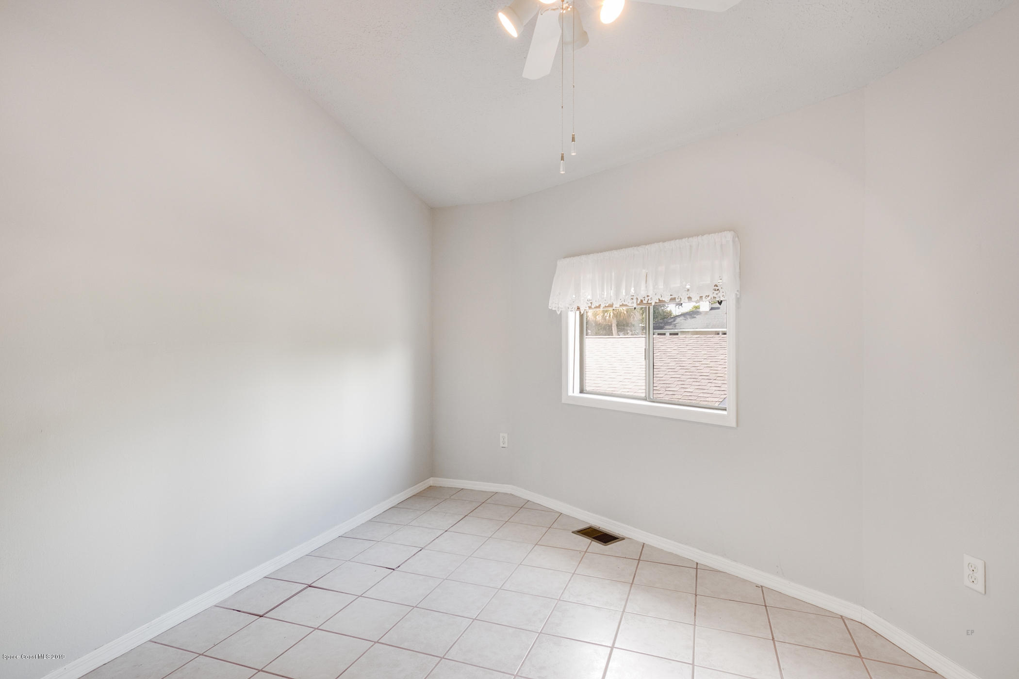 1191 Sunswept Road Northeast Palm Bay, FL 32905 - Photo 35 of 40 Guest bedroom