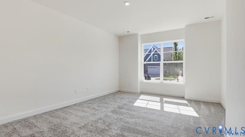 1792 Outrigger Drive Chester, VA 23836 - Photo 22 of 45 an empty room with windows