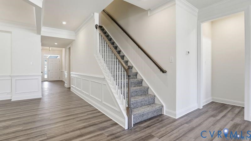 1792 Outrigger Drive Chester, VA 23836 - Photo 30 of 45 a view of a hallway with wooden floor and staircase