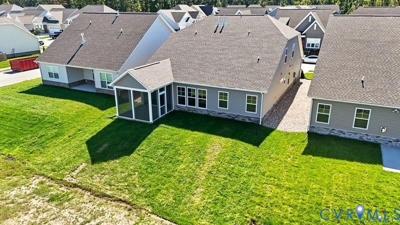 1792 Outrigger Drive Chester, VA 23836 - Photo 40 of 45 a aerial view of a house with a yard table and chairs