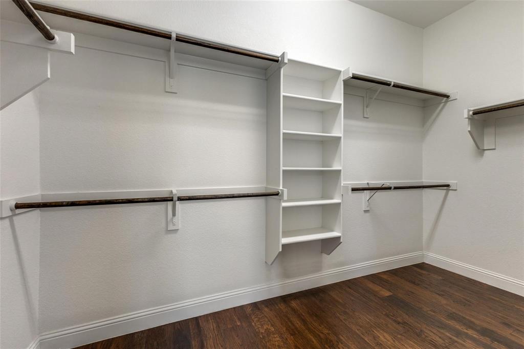 4412 Evenstar Way Plano, TX 75074 - Photo 12 of 30 a view of an empty walk in closet
