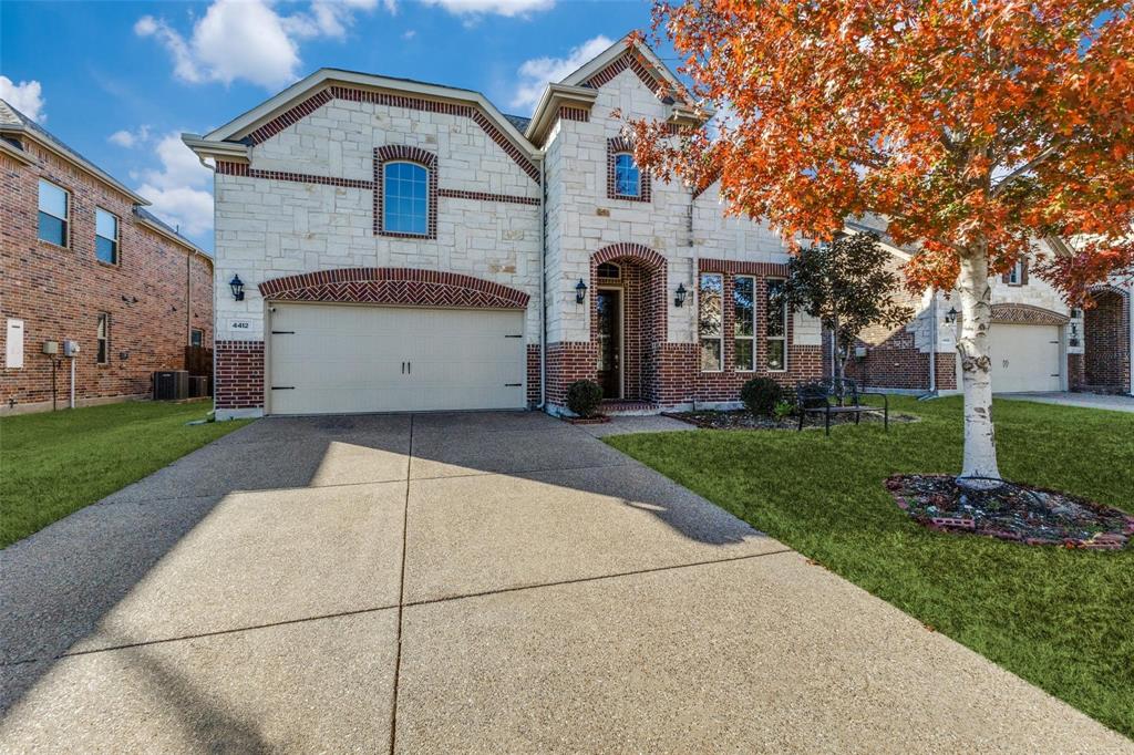 4412 Evenstar Way Plano, TX 75074 - Photo 2 of 30 a view of a white house with a yard