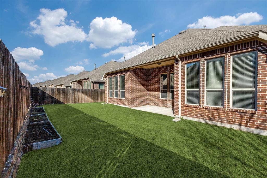 4412 Evenstar Way Plano, TX 75074 - Photo 5 of 30 a view of a house with backyard and porch