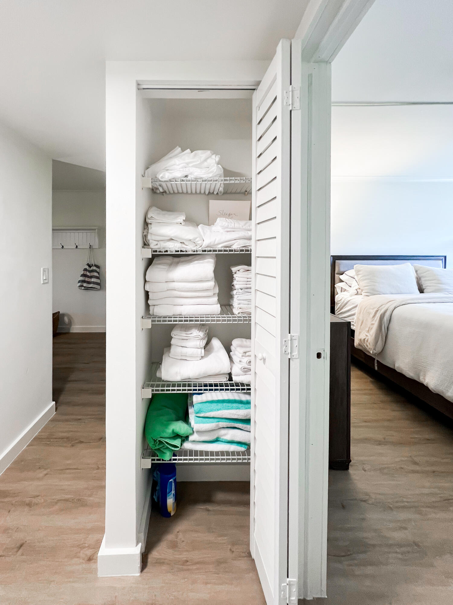 1605 Highway 1, Unit C103 Jupiter, FL 33477 - Photo 18 of 26 a bedroom with furniture and a window
