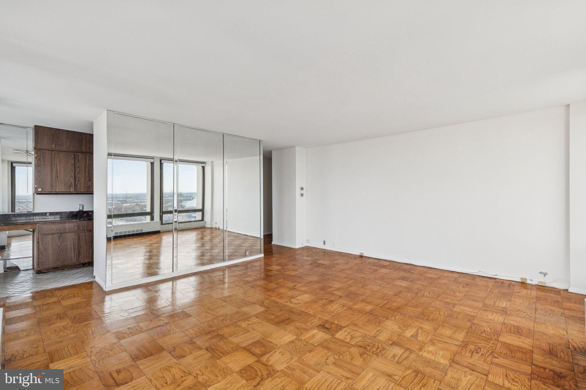 220 Locust Street, Unit 28GS Philadelphia, PA 19106 - Photo 4 of 21 a view of an empty room and window