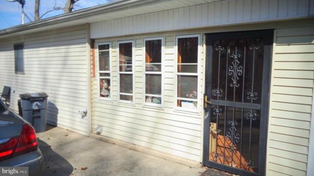 6 Strebor Road Baltimore, MD 21219 - Photo 2 of 5 a view of a house with a door and wooden floor