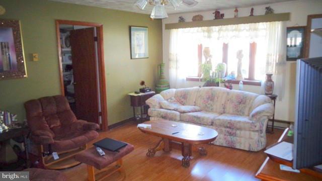 6 Strebor Road Baltimore, MD 21219 - Photo 3 of 5 a living room with furniture and a large window