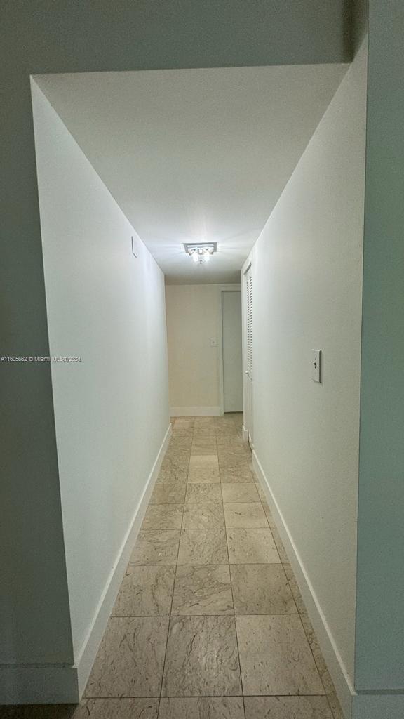 919 Hillcrest Drive, Unit 201 Hollywood, FL 33021 - Photo 4 of 14 a view of hallway with an empty space