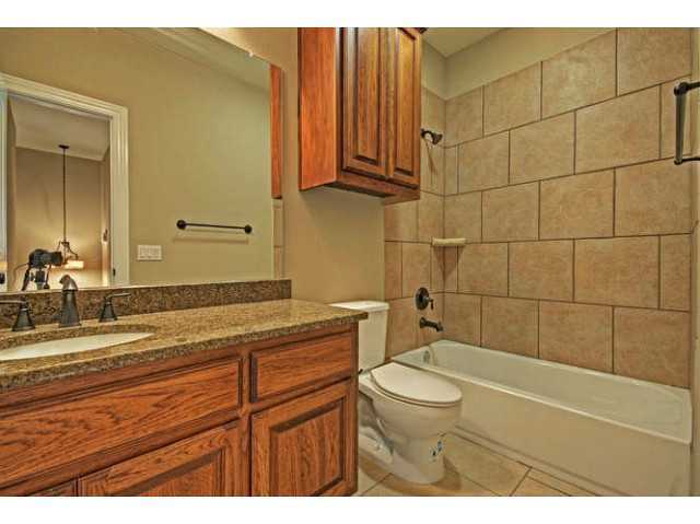 3315 Minnie Street, Unit B Austin, TX 78745 - Photo 15 of 17 Upstairs Hall Bathroom
