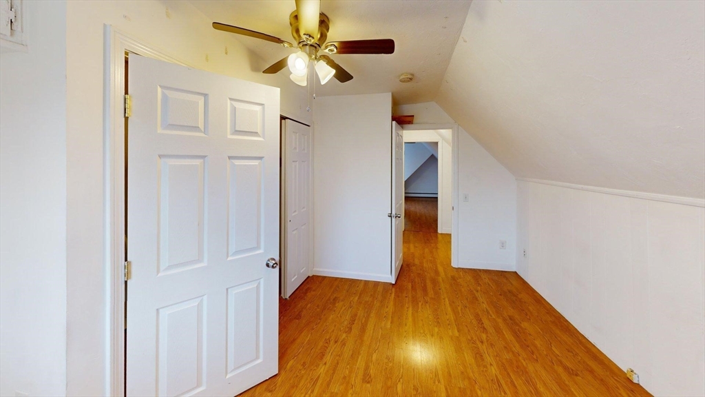 78 Fremont Street, Unit 78 Somerville, MA 02145 - Photo 14 of 30 a view of empty room with wooden floor