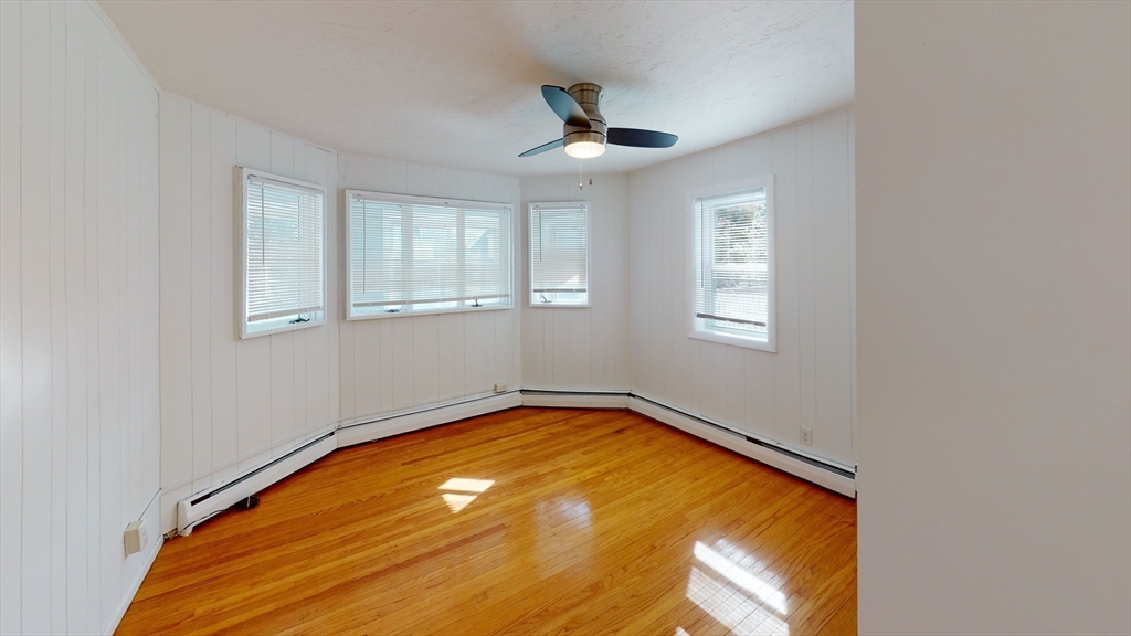 78 Fremont Street, Unit 78 Somerville, MA 02145 - Photo 8 of 30 an empty room with windows