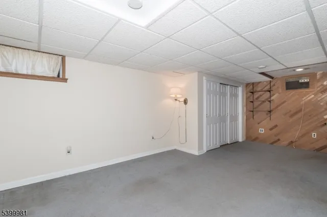 a bathroom with a toilet sink and shower