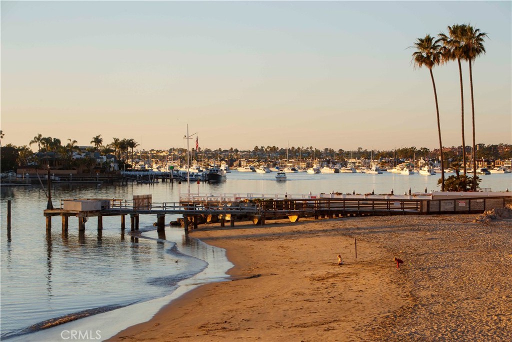 2708 Shell Street Corona del Mar, CA 92625 - Photo 29 of 33 a view of a lake with boats and trees in the background