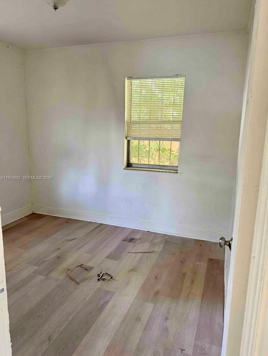 413 Northwest 63rd Street Miami, FL 33150 - Photo 28 of 55 an empty room with a window
