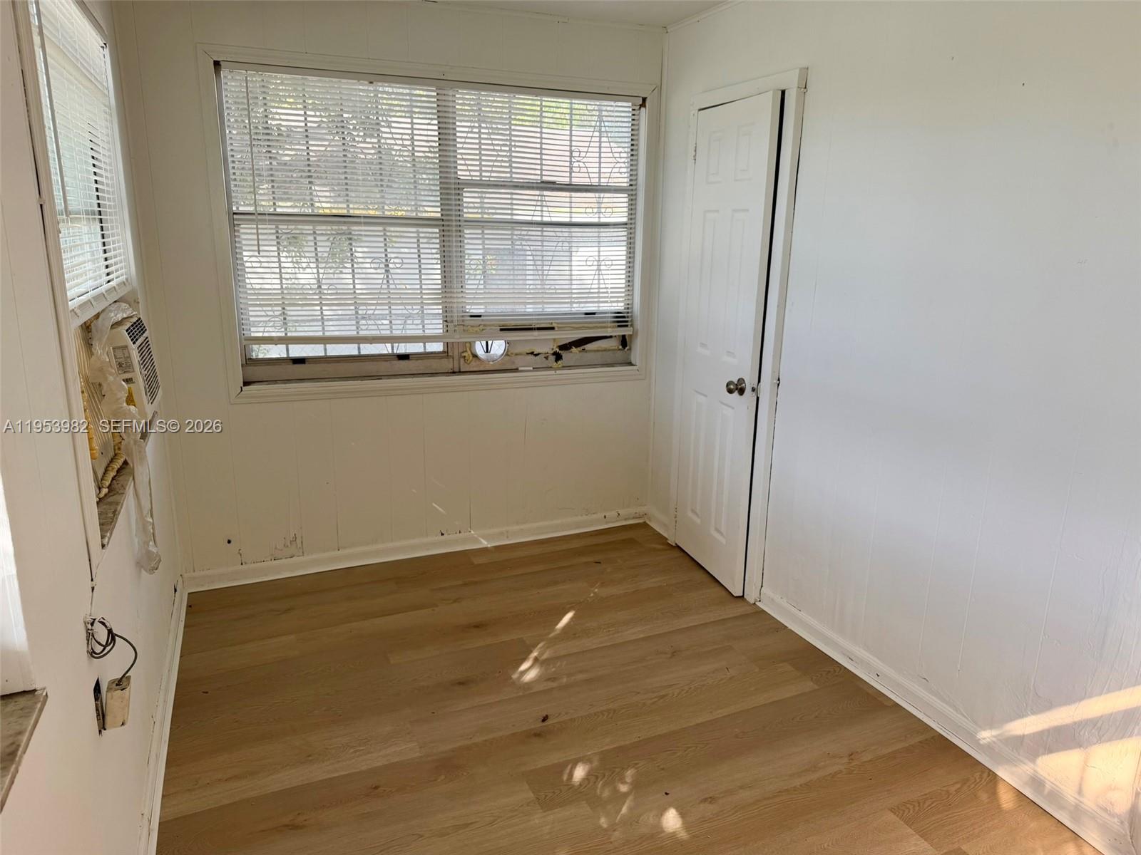 413 Northwest 63rd Street Miami, FL 33150 - Photo 43 of 55 a view of an empty room with a window