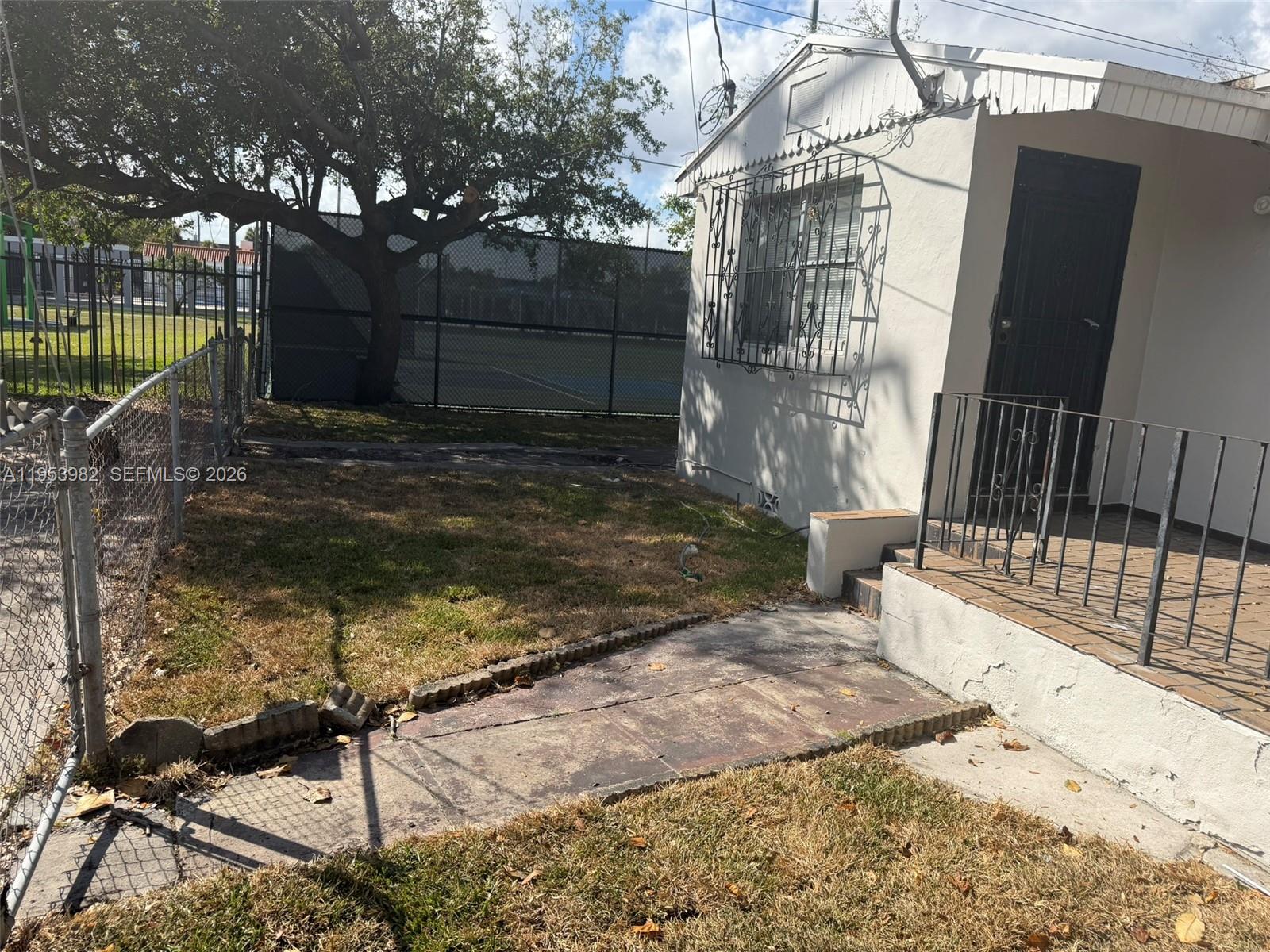 413 Northwest 63rd Street Miami, FL 33150 - Photo 5 of 55 a view of a backyard