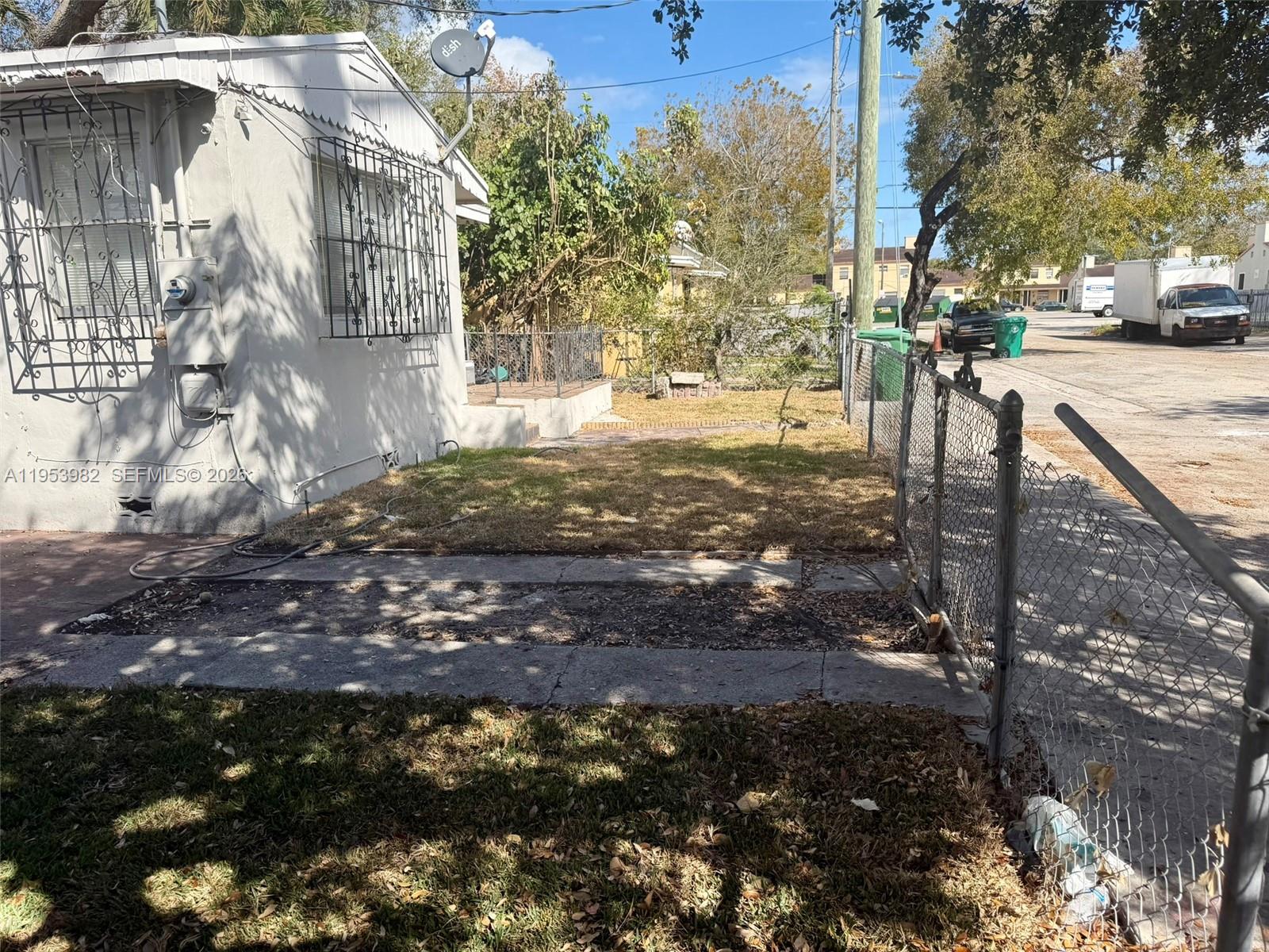 413 Northwest 63rd Street Miami, FL 33150 - Photo 8 of 55 a view of a yard with plants and trees