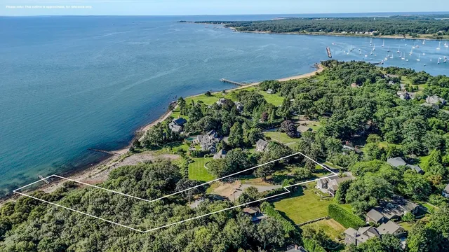 view of a lake with a yard