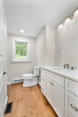 a bathroom with a sink and a toilet