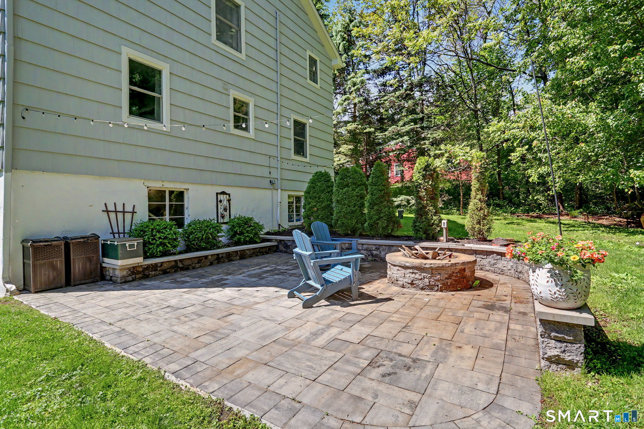 2 Rising Road Norwalk, CT 06850 - Photo 27 of 33 a view of a backyard with sitting area