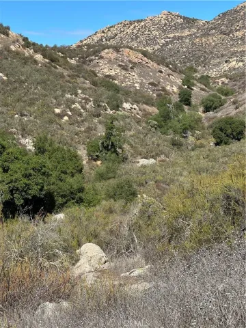 a view of a lake with mountain