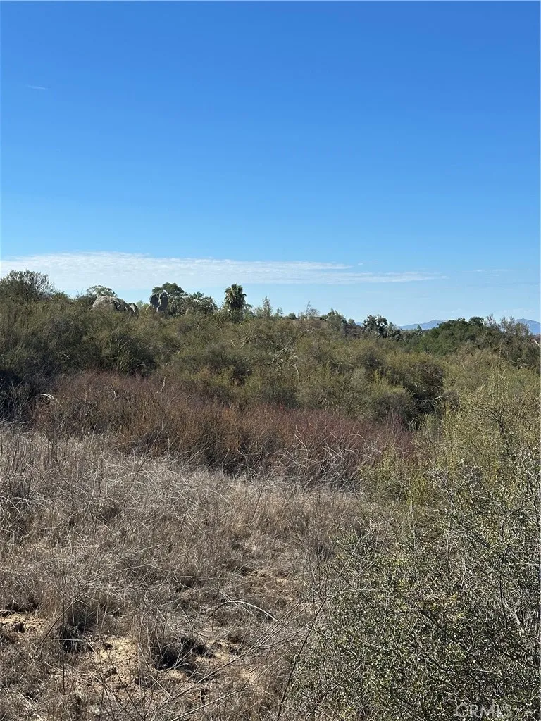 0 Remuda Wildomar, CA 92595 - Photo 30 of 35 a view of a dry field with trees in background
