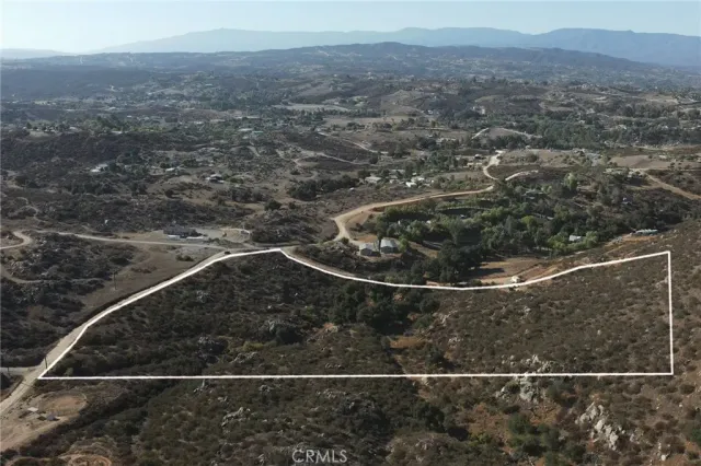 an aerial view of residential house and space