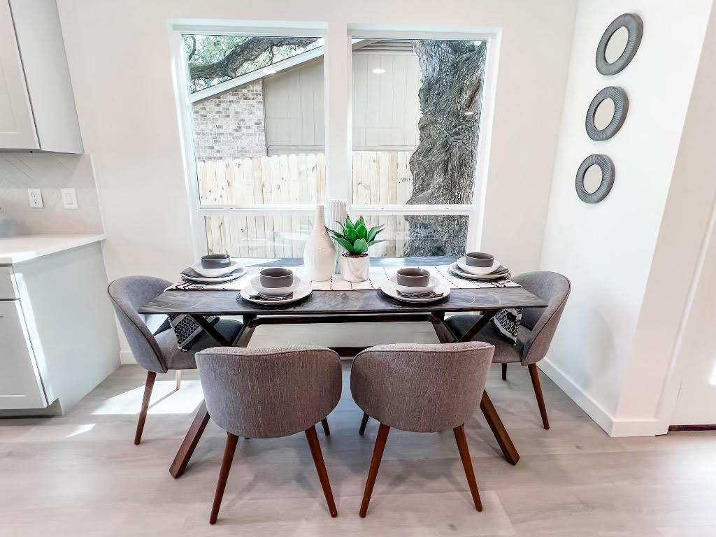 5013 Cana Cove, Unit A Austin, TX 78749 - Photo 12 of 28 a view of a dining room with furniture and window