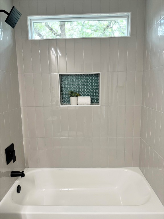 5013 Cana Cove, Unit A Austin, TX 78749 - Photo 18 of 28 a bathroom with a bathtub and a shower