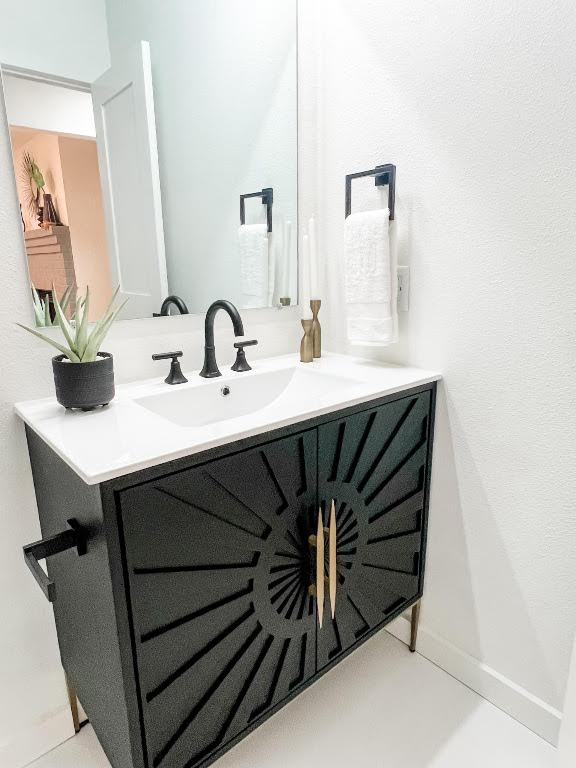 5013 Cana Cove, Unit A Austin, TX 78749 - Photo 20 of 28 a bathroom with a sink and a mirror