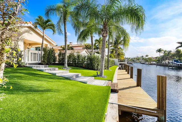 a view of a patio with swimming pool