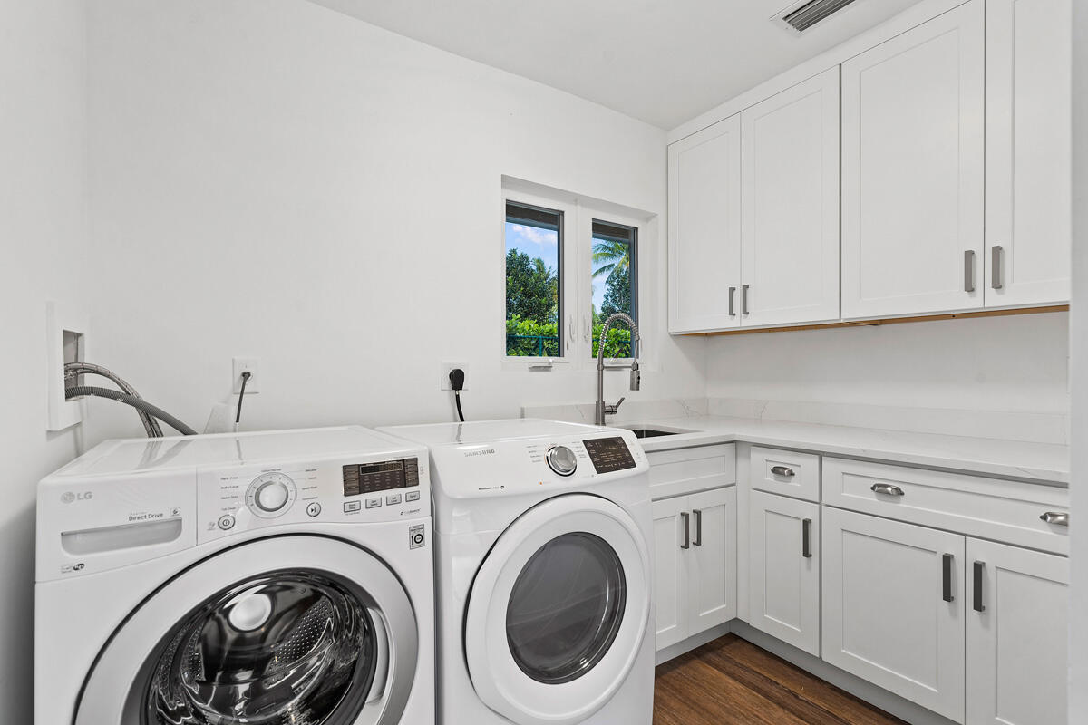 533 East Alexander Palm Road Boca Raton, FL 33432 - Photo 37 of 44 a utility room with dryer and washer