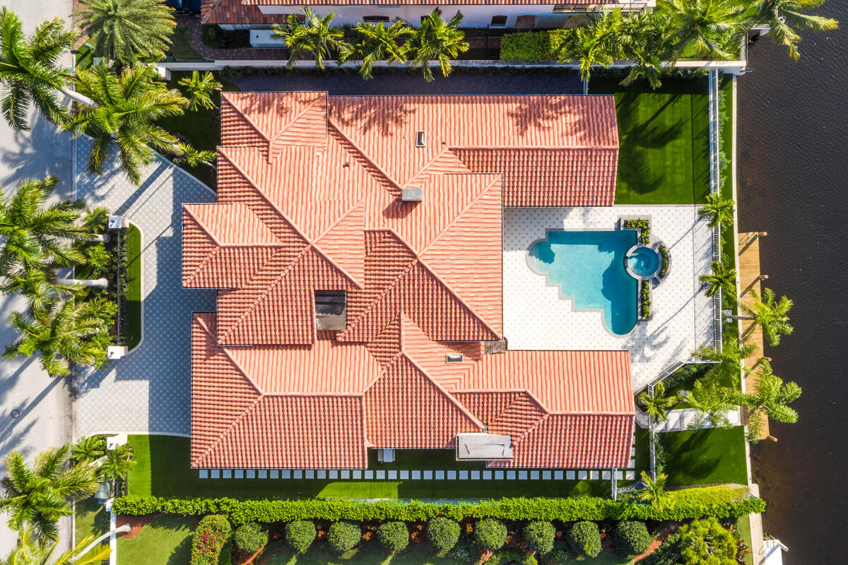 533 East Alexander Palm Road Boca Raton, FL 33432 - Photo 40 of 44 an aerial view of a house with a yard and potted plants